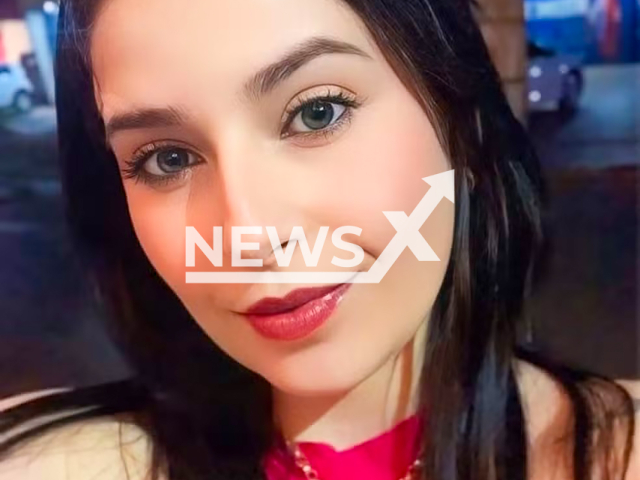 Aline Rodrigues, 32, poses in undated photo. She died after being shot in Caarapo, Brazil, undated. Her friend was also shot. Note: Private photo taken from local media. (Newsflash/NX)