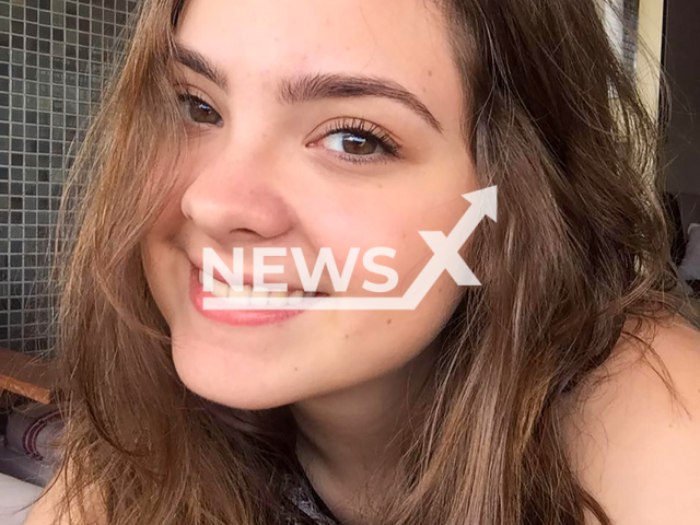 Giulia Panchoni Righetto, 26, poses in undated photo. She died when the roof of a church fell in Salvador, Brazil. Note: Private photo taken from social media.(Newsflash/NX)