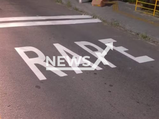 Road sign that was mistakenly painted to say 'rape' on Rua Itambe, in Divinopolis, Brazil, undated. The sign was supposed to say 'pare', which is Portuguese for 'stop'. Note: Picture was taken from social media. (Newsflash/newsX)