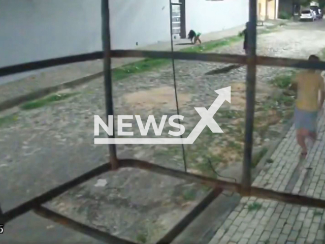 A woman runs from the attacker in Caucaia, Brazil, on Feb.15, 2025. The victim survived after the firearm failed. Note: Photo is a screenshot from a video(Newsflash/NX)