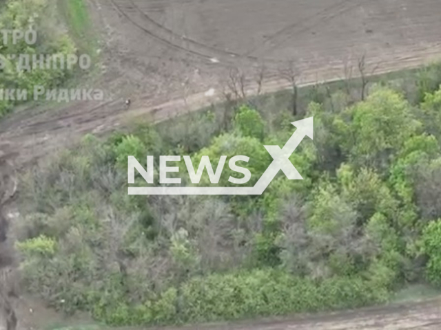 The artillery of the Armed Forces of Ukraine with TrO 98 Azov Dnipro destroyed two BMP2 units and Russian infantry, in May, 2022, in Ukraine. Note: Picture is a screenshot from a video (@azov_dnipro/Newsflash)