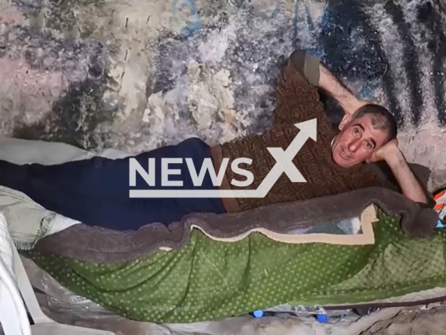 Picture shows Ali Bozoglan, 55, who is living in a cave for two years after his house was destroyed in an earthquake in Hatay, Turkey, undated. He is married and is father of three. Note: Image is a screenshot from video. (Newsflash/NX)