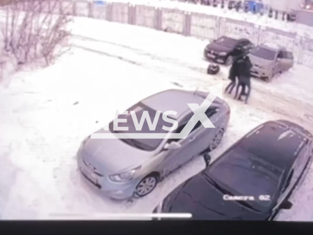 This image is a screen grab of the video supplied titled NewsX-RobbedBar-01.mp4: A man with a grenade robbed a bar in Kokhma, Russia on October 2024. The robber was detained several hours after the second attack - running away from the gas station, the man left footprints in the snow. (	
Clipzilla/NX)