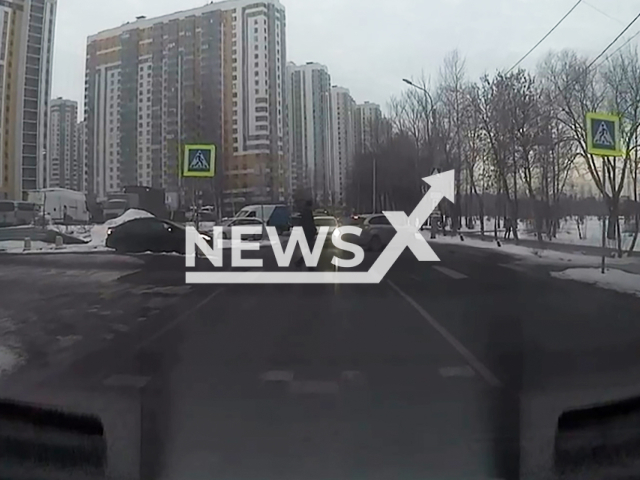 This image is a screen grab of the video supplied titled NewsX-RoadCollide-01.mp4: A driver was overtaking a traffic jam and collided with a car pulling out at Southern Highway in Saint Petersburg, Russia on Tuesday, Feb. 25, 2025.