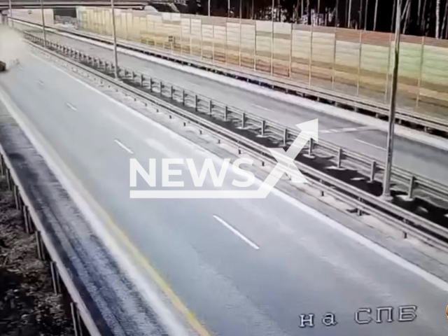 This image is a screen grab of the video supplied titled NewsX-HighwaySmash-01.mp4: BMW crashes into barrier on a highway near Tver, Russia, Feb. 22, 2025. Two people died on spot.(Clipzilla/NX)