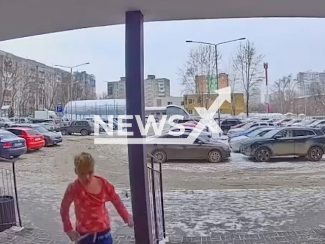 The nine-year-old boy tries to escape from his violent stepfather in Perm, Russia, on 1 March, 2025. The man reportedly tried to drown him in a bathtub. Note: Photo is a screenshot from a video. (Newsflash/NX)