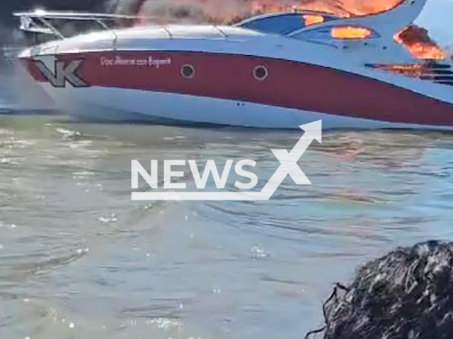 A boat burns in flames in Pontal do Parana, Brazil, on Mar.02, 2025.The people on board were evacuated. Note: Photo is a screenshot from a video(Newsflash/NX)