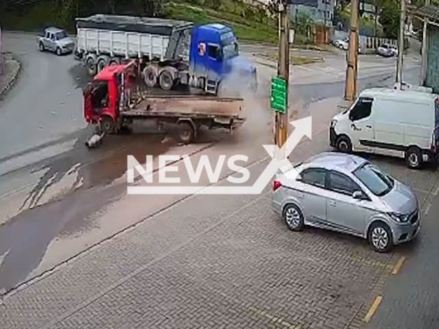 This image is a screen grab of the video supplied titled NewsX-HendyCool-01.mp4: Video shows driver being ejected after collision between trucks in Rio Branco do Sul, Parana in Brazil, Monday, March 17, 2025. Security cameras recorded the accident.(Clipzilla/NX)