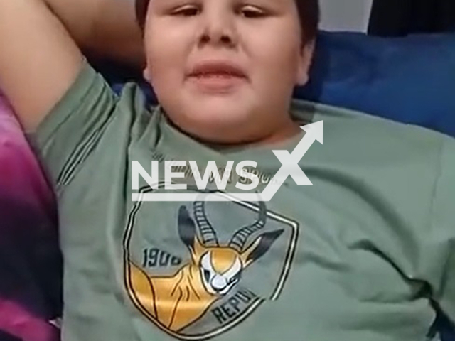 Picture shows seven-year-old Johandre Blom recovering after crocodile attack near Brits, South Africa. He lost his arm. Note: Image is a screenshot from video. (Newsflash/NX)