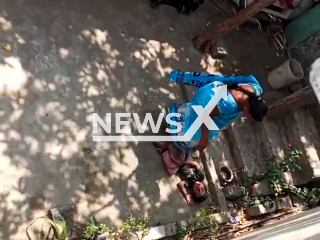Mother brutally beats son in Jagtial district, India, undated. Child was reportedly sent to domestic abuse help centre. Note: Photo is a screenshot from a video. (Newsflash/NX)