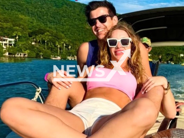 Dionn Roberth, 28, and Aline Rabuske, 31, pose in undated photo. The couple died after being run over in Penha, Santa Catarina in Brazil. Note: Private photo taken from local media. (Newsflash/NX)