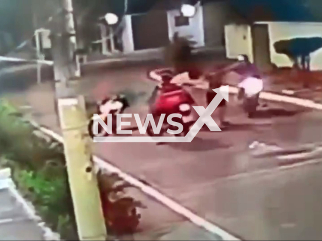 This image is a screen grab of the video supplied titled NewsX-BikRobberies-01.mp4: CCTV shows bandits robbing a man, stealing his motorcycle, and leaving him in just his underwear on the street in Nova Iguacu, Brazil on Sunday, Apr. 27, 2025.(Clipzilla/NX)