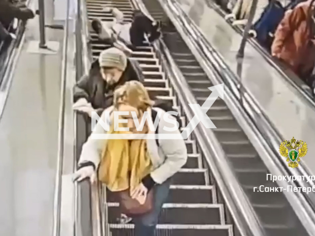 This image is a screen grab of the video supplied titled NewsX-EscalatorFall-01.mp4: Two female passengers fell off an escalator after it suddenly started in the St. Petersburg metro, Russia on Wednesday, Apr. 30, 2025 (Clipzilla/NX)