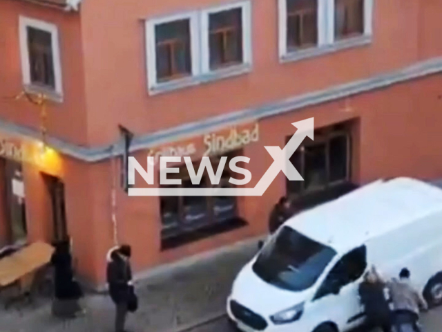 Video shows the kidnapping of a girl in Erfurt, Germany, Jan. 31, 2025. A father and son dragged a 16-year-old girl off the street into a white van and sped off.  Note: Photo is a screenshot from a video. (Newsflash/NX)