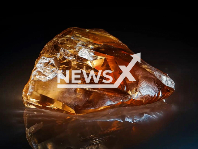 This image is a screen grab of the video supplied titled NewsX-BigDiamond-01.mp4: Footage shows an amber crystal weighing 468.30 carats and measuring 56x54x22 millimeters found by Alrosa in Sakha Republic, Russia, undated. Alrosa announced the news on Thursday, May 8, 2025.(@Alrosa_news/Clipzilla/NX)