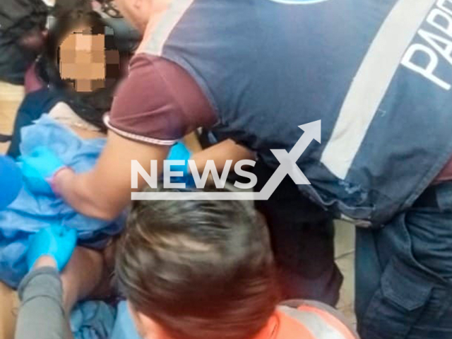 Picture shows the 13-year-old giving birth, undated. The teenager gave birth in a subway in Mexico City, Mexico, on May 10, 2025. Note: Police photo. (Mexico City Police/Newsflash/NX)