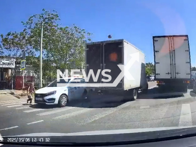 This image is a screen grab of the video supplied titled NewsX-TaxiGirl-01.mp4: Footage shows a taxi hitting a 10-year-old girl at a pedestrian crossing in Anapa, Russia on Tuesday, May 6, 2025.(Clipzilla/NX)