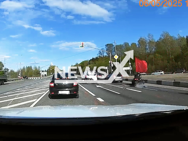This image is a screen grab of the video supplied titled NewsX-ShotinFootin-01.mp4: Dash cam captures two motorcyclists from a rally colliding on the M-1 highway in the Moscow region, Russia on Tuesday, May 6, 2025.(Clipzilla/NX)