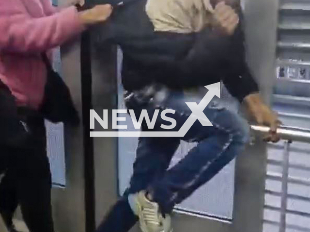 Women beat an alleged thief in TransMilenio, Bogota, Colombia, undated. He reportedly tried to steal a mobile phone. Note: Photo is a screenshot from a video(Newsflash/NX)