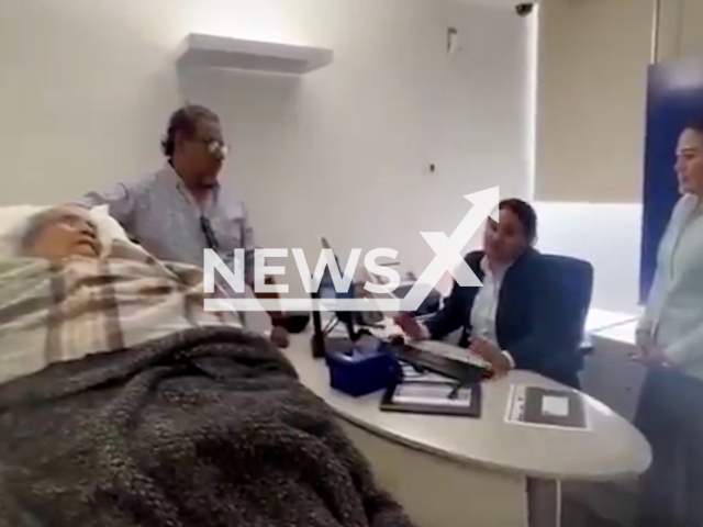 Fidelia Vasquez Nuno, 96, lies in a stretcher in a bank in Oaxaca, Mexico, undated. She had to be taken in person to collect her pension. Note: Photo is a screenshot from a video. (Newsflash/NX)