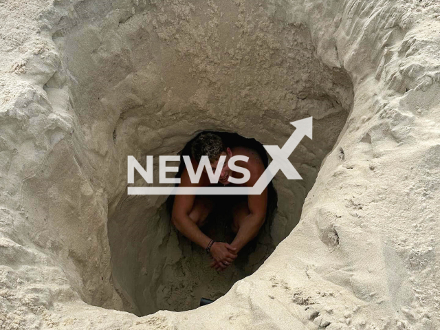 Picture shows Jensen wjj Sturgeon in the sand, undated. He was rescued after spending more than three hours in the sand in Copacabana Beach, Brazil, Note: Licensed photo. (@jws.9/Newsflash/NX)