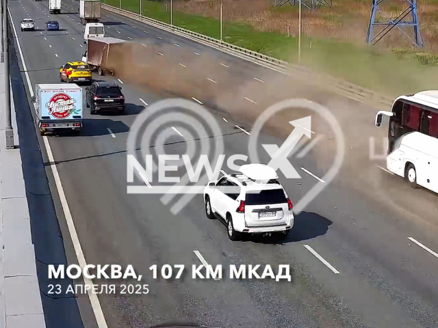 This image is a screen grab of the video supplied titled NewsX-SlowHit-01.mp4: A slow-moving lorry is rear-ended by a bus on the Moscow Ring Road, Russia on 23 April, 2025.(Clipzilla/NX)