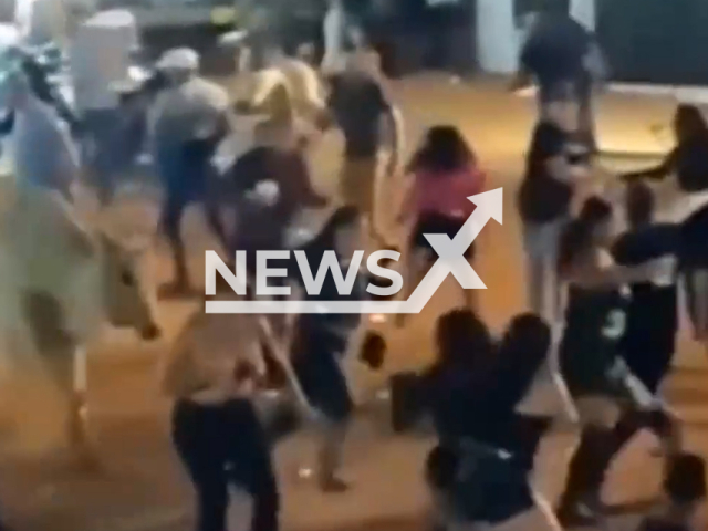 A bull runs among people in Sao Joao D'Alianca, Goias, Brazil, on May 09,2025. According to reports, the bull used its own horn to open the gate. Note: Photo is a screenshot from a video. (Newsflash/NX)