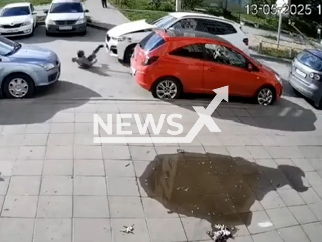 This image is a screen grab of the video supplied titled NewsX-RunChild-01.mp4: A seven-year-old boy ran out onto the road and was hit by a BMW in Lipetsk,  Russia on Tuesday, May 13, 2025.(Clipzilla/NX)