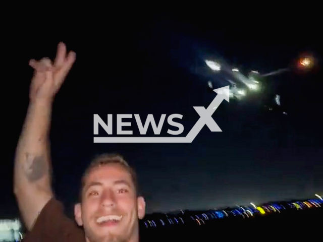 Young people invade Tom Jobim International Airport runway in Rio, Brazil, undated. The case is being investigated by the Federal Police. Note: Photo is a screenshot from a video. (Newsflash/NX)