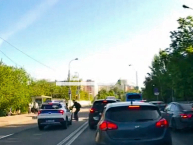 This image is a screen grab of the video supplied titled NewsX-PolCarColl-01.mp4: A police car collides with a scooter in South Moscow, Russia on Wednesday, May 21, 2025.(Clipzilla/NX)