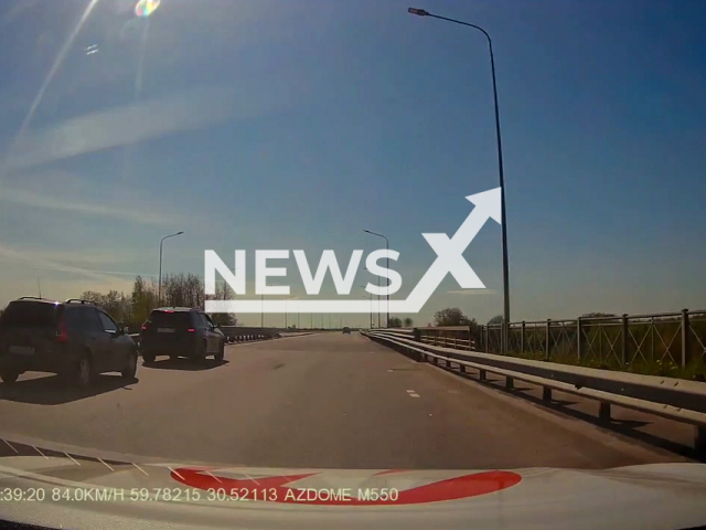 This image is a screen grab of the video supplied titled NewsX-SlowLane-01.mp4: Road rage driver fury at a fast lane slow driver on the Ust-Izhorskoe highway in Saint Petersburg, Russia on Tuesday, May 20, 2025.(Clipzilla/NX)
