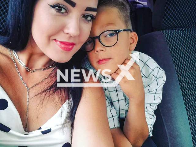 Olivia Botusan poses with her child  in undated photo. Her lifeless body was found in Etterbeek, Belgium, on May 19, 2025. Note: Private photo taken from social media. (Newsflash/NX)