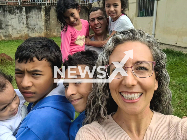 Picture shows Jeniffer and Julio with their children, undated. Jeniffer Aparecida Amaral Souza de Oliveira and Julio Cesar Soares de Oliveira adopted five siblings in Parana, Brazil. Note: Private photo taken from social media. (@paisefilhos.adocao/Newsflash/NX)