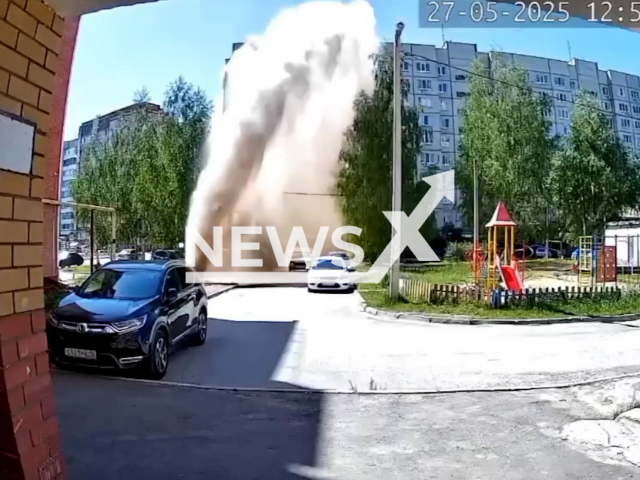 This image is a screen grab of the video supplied titled NewsX-PipeWater-01.mp4: A fountain of water several meters high gushed out in a courtyard in Yoshkar-Ola, Russia on Tuesday, May 27, 2025.(Clipzilla/NX)