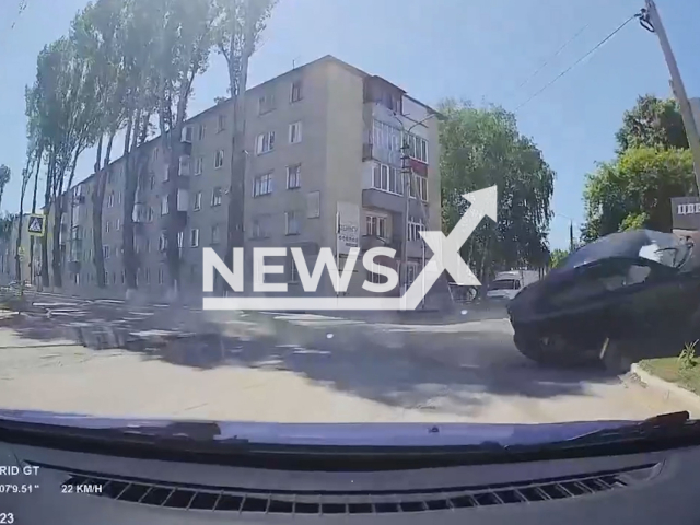 This image is a screen grab of the video supplied titled NewsX-MazdaControl-01.mp4: A Mazda driver crashes into a utility pole in Pokhvistnevo, Samara Oblast, Russia on Tuesday, May 27, 2025. (Clipzilla/NX)