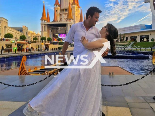 Husamettin Keklik, 30, poses with wife Duriye Cigdem Keklik, 33, in undated photo. She allegedly committed suicide with a shotgun in her home in the Aksu district of Antalya, Turkey, Feb. 14, 2025. Note: Private photo taken from social media. (Newsflash/NX)