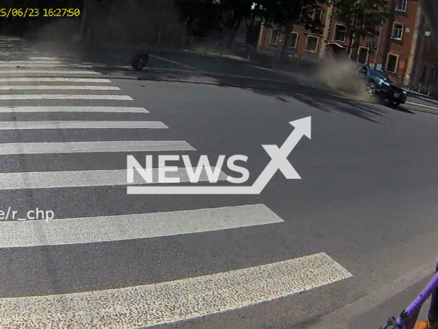 This image is a screen grab of the video supplied titled NewsX-SkidWheel-01.mp4: Footage shows a car sliding on the road after the wheel comes off in Saint Petersburg, Russia on Monday, June 23, 2025. (Clipzilla/NX)