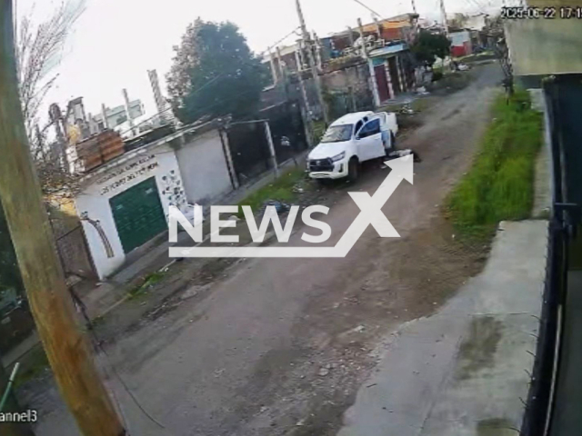 Men rob a woman who was about to report a robbery when she was assaulted again in Gonzalez Catan, Argentina, June 22, 2025. In the first robbery, the window of her truck was smashed, and when she was about to file a report, she was robbed again. Note: Photo is a screenshot from a video(Newsflash/NX)