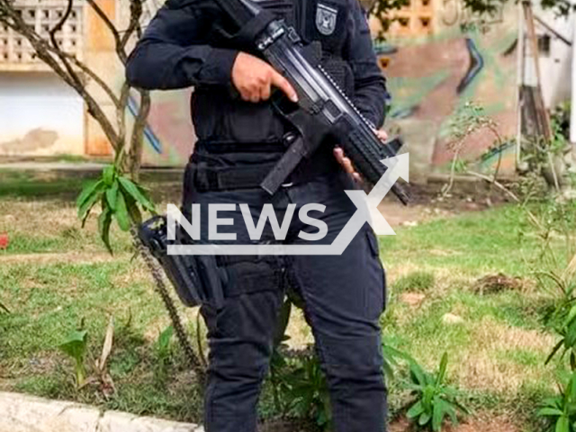 Joneuma Silva Neres, 33, poses in undated photo. She is the former director of the Eunapolis Penitentiary Complex, Brazil. Note: Private photo. (Newsflash/NX)