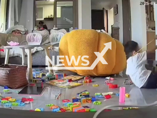 Girl nearly suffocates boy with cable tie while playing in Guangdong, China, undated. His mother rescued him. Note: Photo is a screenshot from a video(AsiaWire/NX)