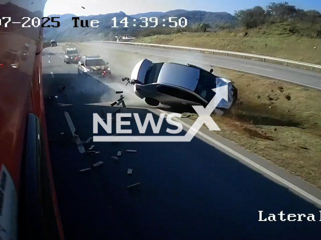 This image is a screen grab of the video supplied titled NewsX-ChesPolice-01.mp4: Driver overturns during police chase on the BR-101 motorway in Brazil, on Jul.08,2025.(Clipzilla/NX)