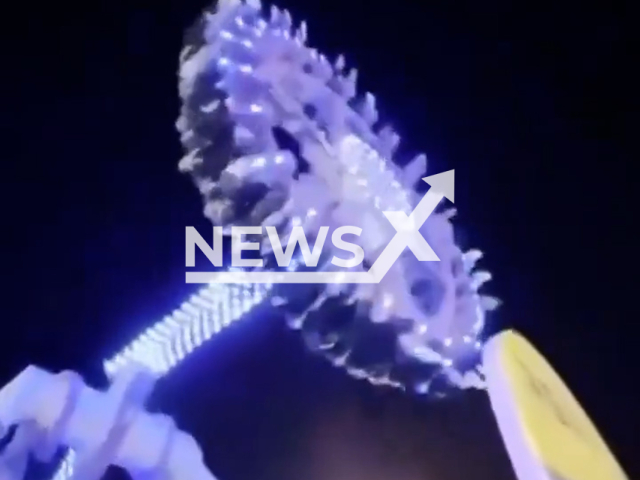 An amusement park ride collapses and emergency services perform a rescue operation in Taif, Saudi Arabia, on Jul.31, 2025. At least 23 people were injured.Note: Photo is a screenshot from a video. (Newsflash/NX)