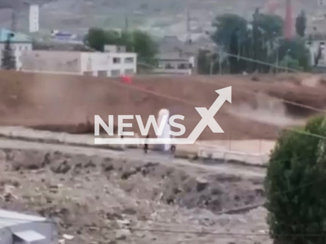 This image is a screen grab of the video supplied titled NewsX-MudflowTyrnyauz-01.mp4: Footage shows a powerful mudflows descending down in the city of Tyrnyauz, Kabardino-Balkarian Republic, Russia on Thursday, July 31, 2025.(Clipzilla/NX)