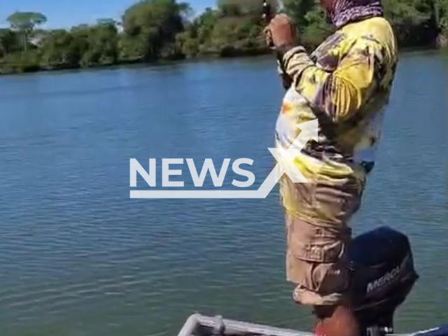 Fishermen pull out a fish carcass in Tocantis, Brazil. on Jul.24, 2025. They believe the fish was devoured by piranhas. Note: Photo is a screenshot from a video(Aurileia Gomes de Andrade dos Santos/Newsflash/NX)