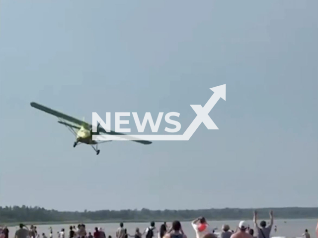 This image is a screen grab of the video supplied titled NewsX-LowFly-01.mp4: Footage shows TR-301 light aircraft flying low on Lake Ladoga near the village of Kokkorevo in the Leningrad Region, Russia on Saturday, July 12, 2025.(Clipzilla/NX)