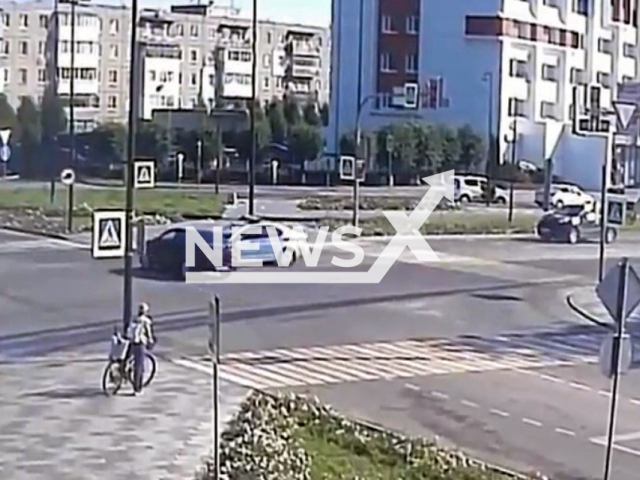 This image is a screen grab of the video supplied titled NewsX-EmptyIntersection-01.mp4: CCTV footage shows a police vehicle crashing into car crossing empty Intersection in Murom, Vladimir Oblast of Russia on Sunday, Aug 3, 2025.(Clipzilla/NX)
