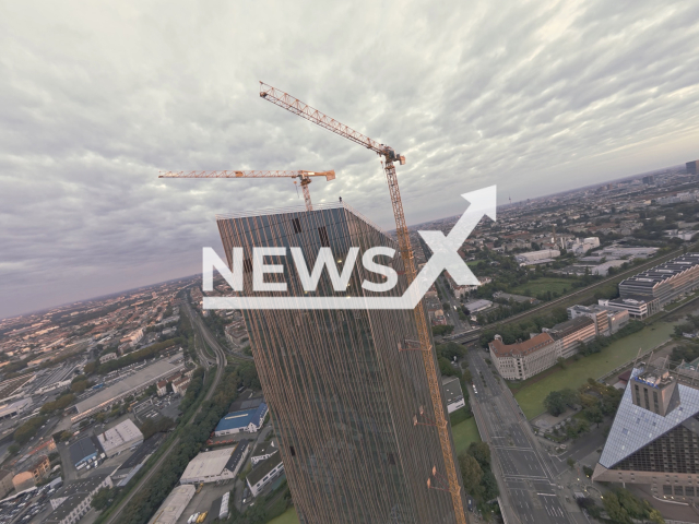 Urban climber and BASE jumper George King successfully completes a daring jump from the newly constructed Estrel Tower, now the tallest building in Berlin, Germany, undated. This jump marks King's third consecutive leap from Berlin's evolving skyline. Note: Licensed photo. (@shardclimber/Newsflash/NX)