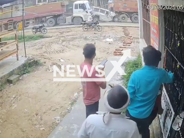 This image is a screen grab of the video supplied titled NewsX-BoleroCrush-01.mp4: CCTV shows a bolero being crushed between two trucks in Gorakhpur, India on Monday, Aug 4, 2025.(Clipzilla/NX)