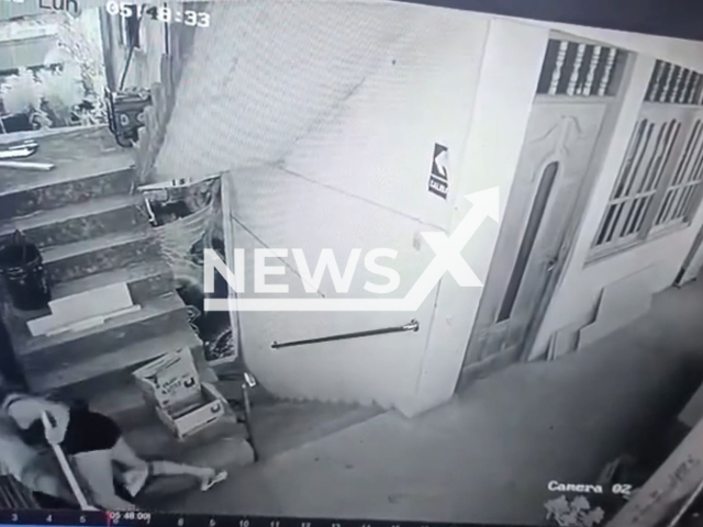 This image is a screen grab of the video supplied titled NewsX-PeruLove-01.mp4: Couple falls from second floor in Los Callejones, Puerto Inca province, Huanuco department in Peru, Aug. 4, 2025. Emely Fiorela Mego Diaz, 21, lost her life, while the man is seriously injured.(Clipzilla/NX)