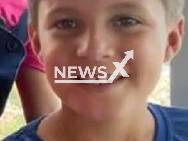 Matheus Lima Brito, 10, poses in undated photo. He died after falling into coffee drying silo in rural Campos Gerais (MG), Brazil. Note: Private photo. (Newsflash/NX)